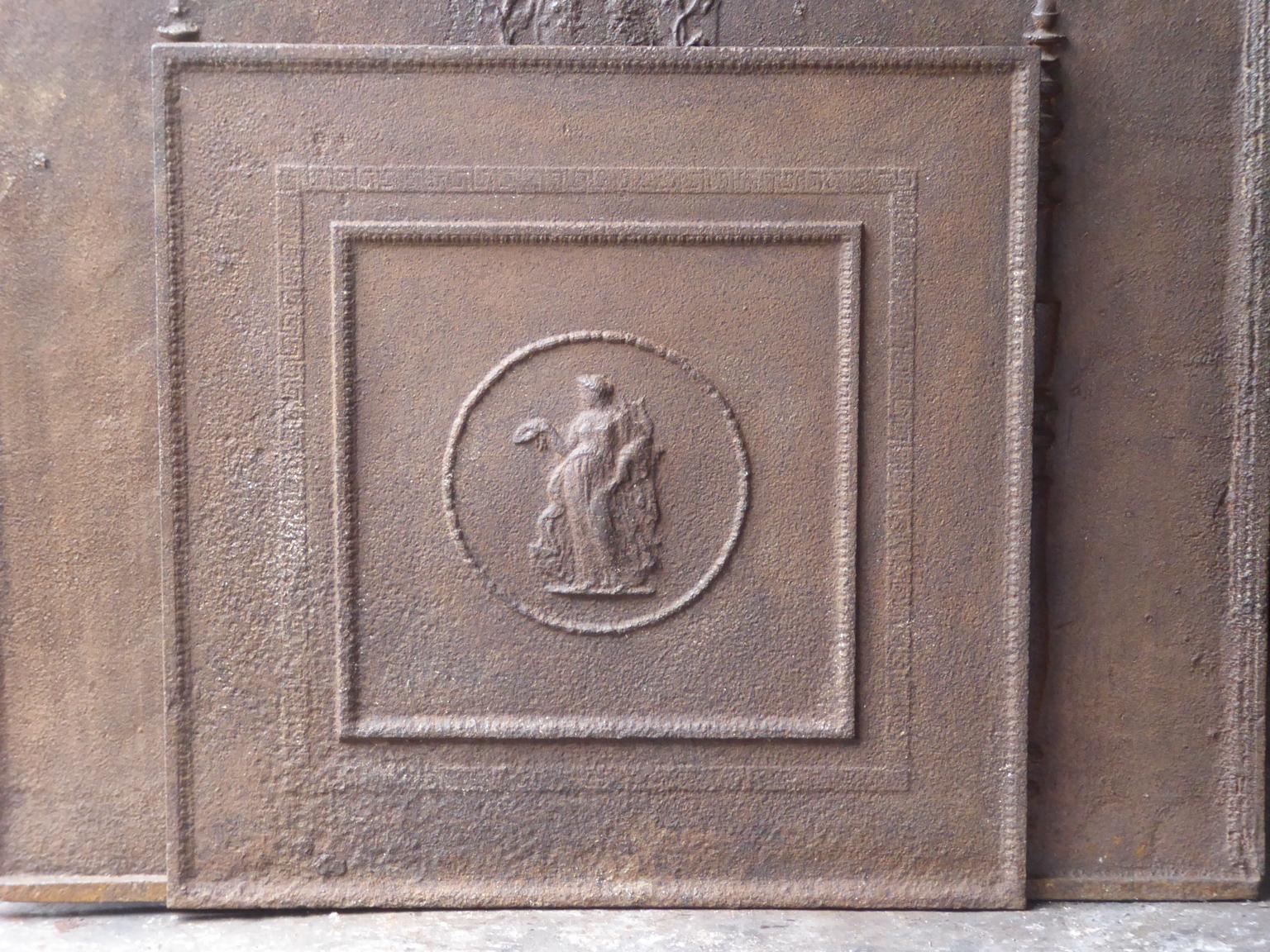 19th century French Napoleon III fireback with an allegory of peace. The allegory of peace is holding an olive branch, symbol for peace and a laurel wreath, symbol for victory, in her hands. The fireback has a natural brown patina. Upon request it