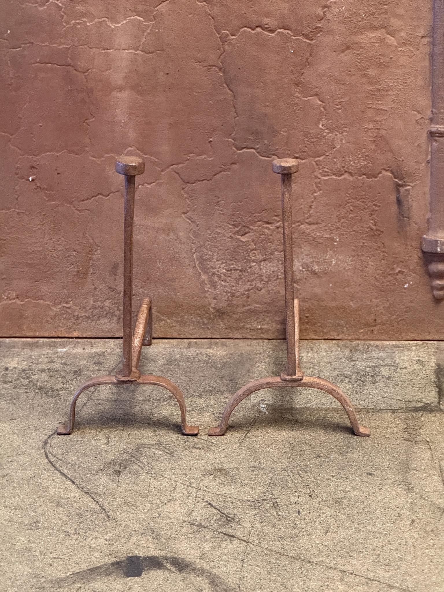 19th century French Napoleon III fireplace andirons or fire dogs, made of wrought iron. The andirons are in a good condition and are fully functional.
