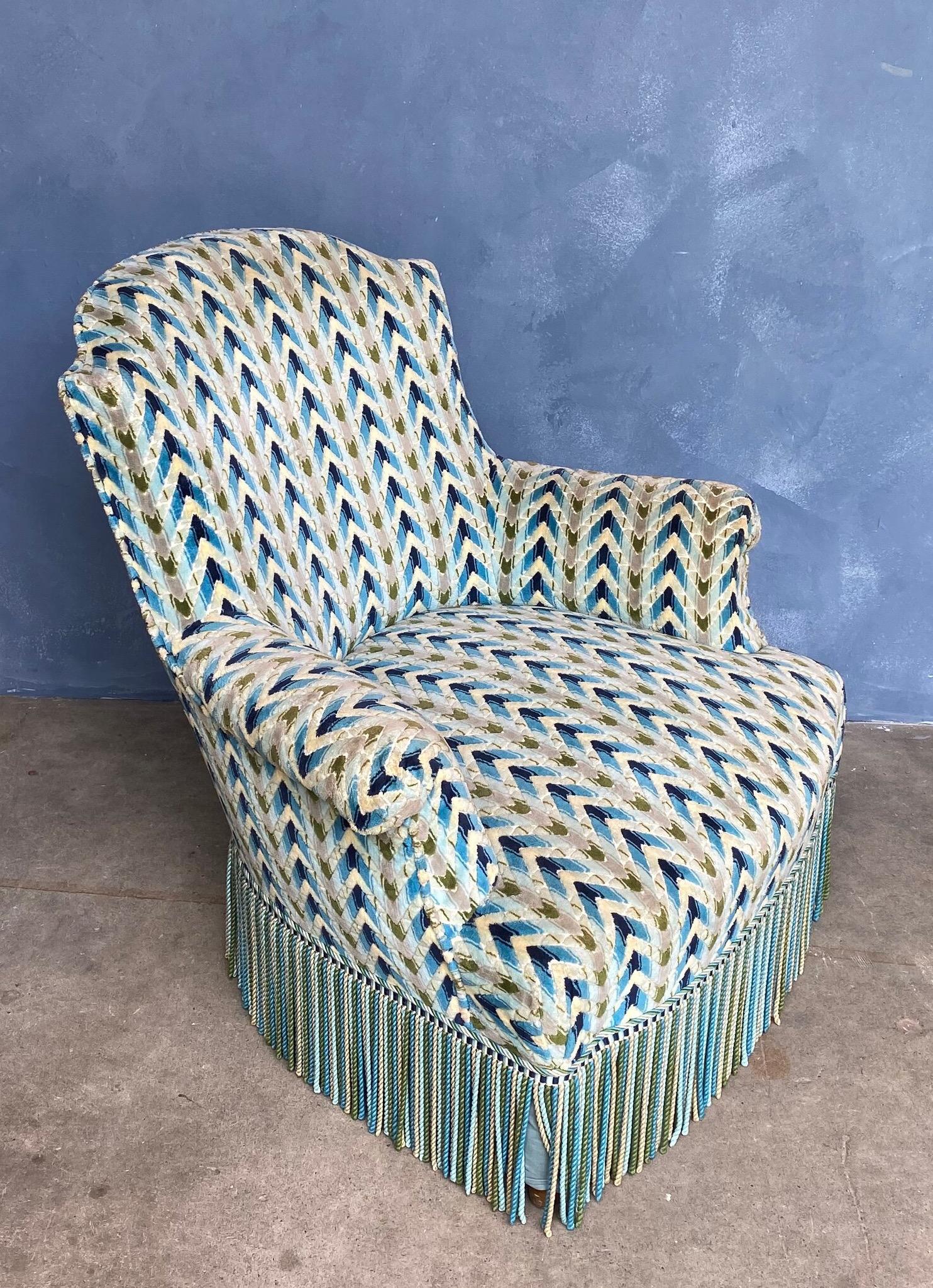 patterned velvet armchair