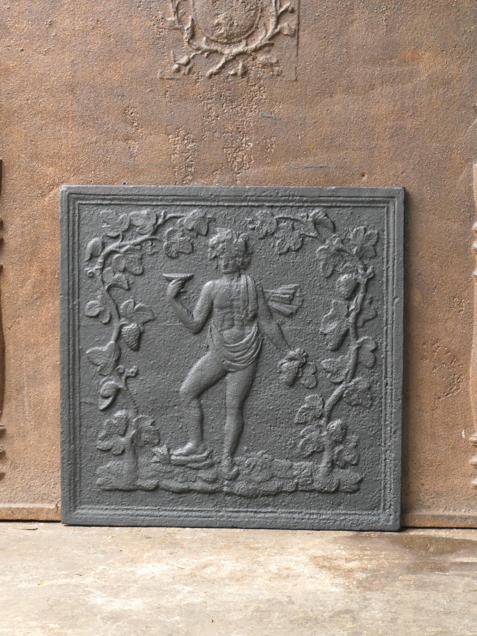 19th Century French Napoleon III fireback with the Roman god Bacchus. God of agriculture, wine and fertility. The fireback is made of cast iron and has a black / pewter patina. The condition is good, no cracks.
 














