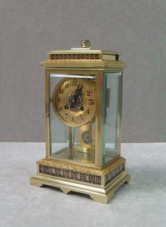 French Napoleon III Brass Four Glass and Champleve Mantel Clock