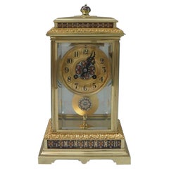 French Napoleon III Brass Four Glass and Champleve Mantel Clock
