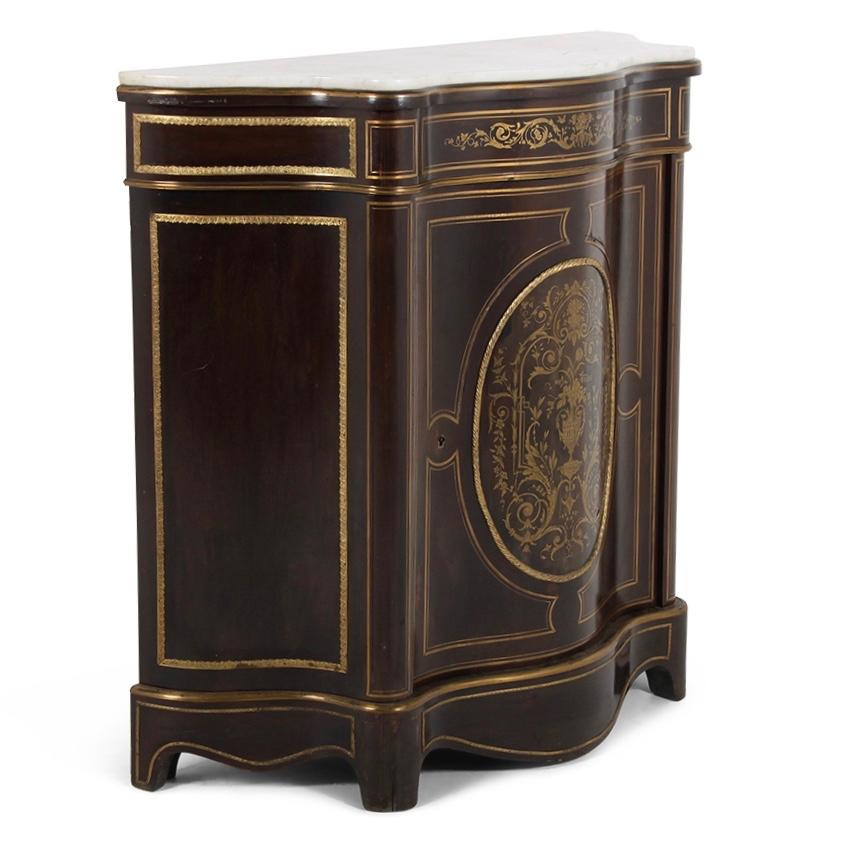 A French Napoleon III serpentine-shaped side cabinet, the ebonized case embellished with brass inlay and stringing, the door with highly-detailed inlay of flowers, swags, urn etc. Shaped marble top with conforming curved brass edge molding.
 