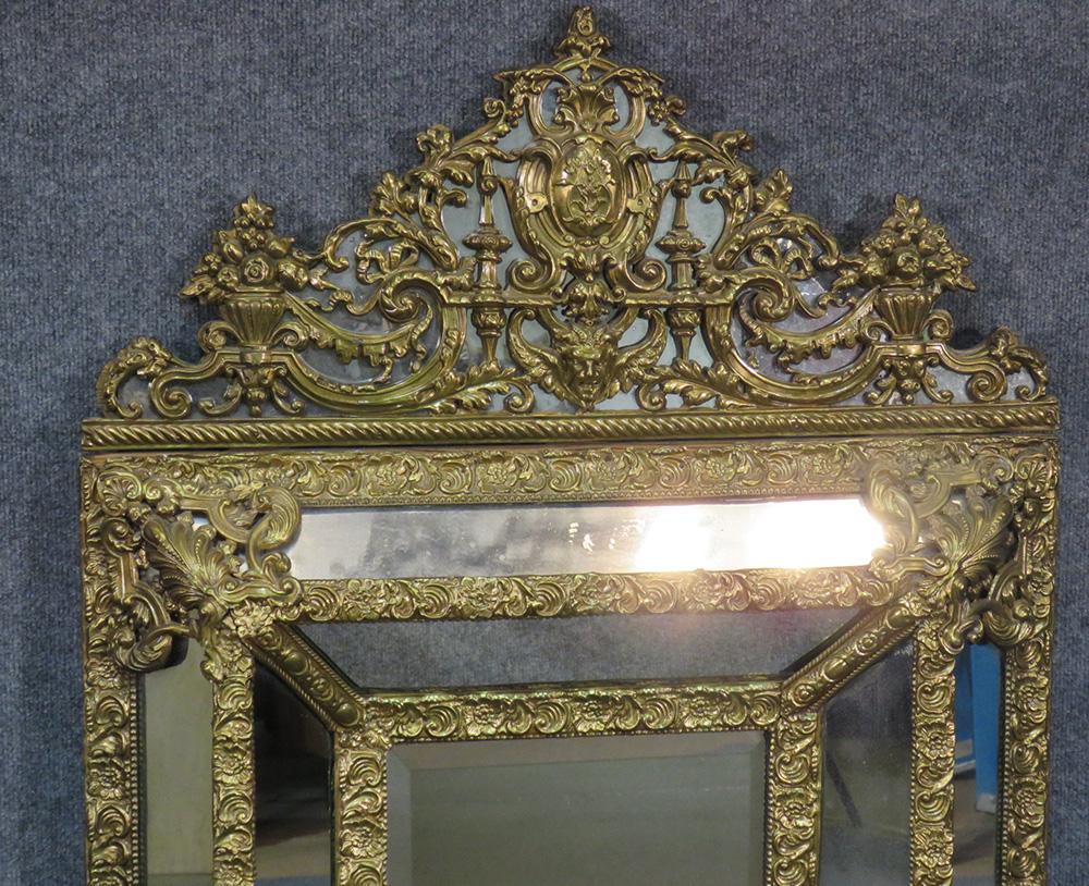 Early 20th Century French Napoleon III Style Brass Repousee Cushion Mirror, circa 1920