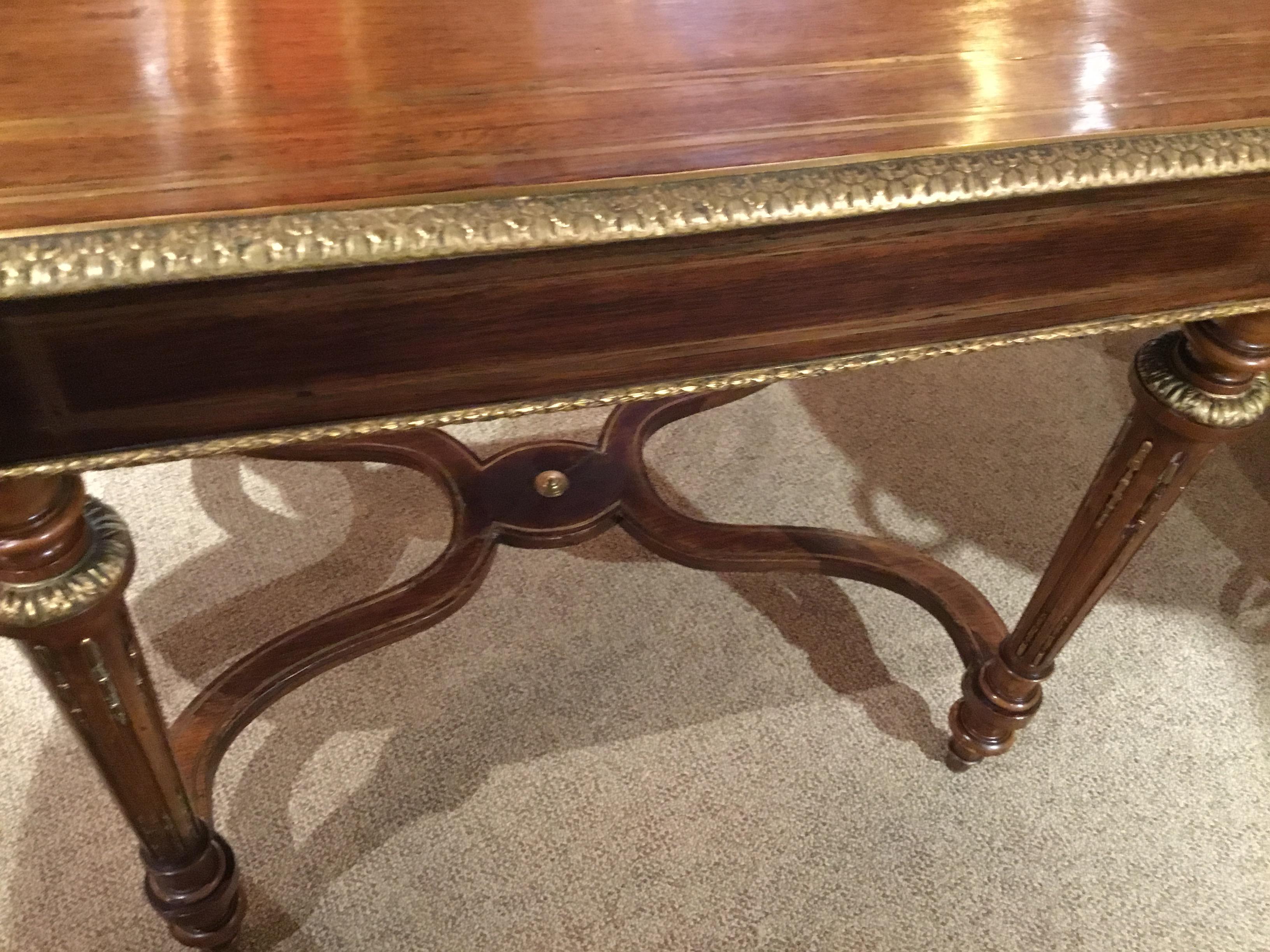 19th Century French Napoleon III Center Table, Oval Form, Brass Inlays, and Gilt Bronze Trim For Sale