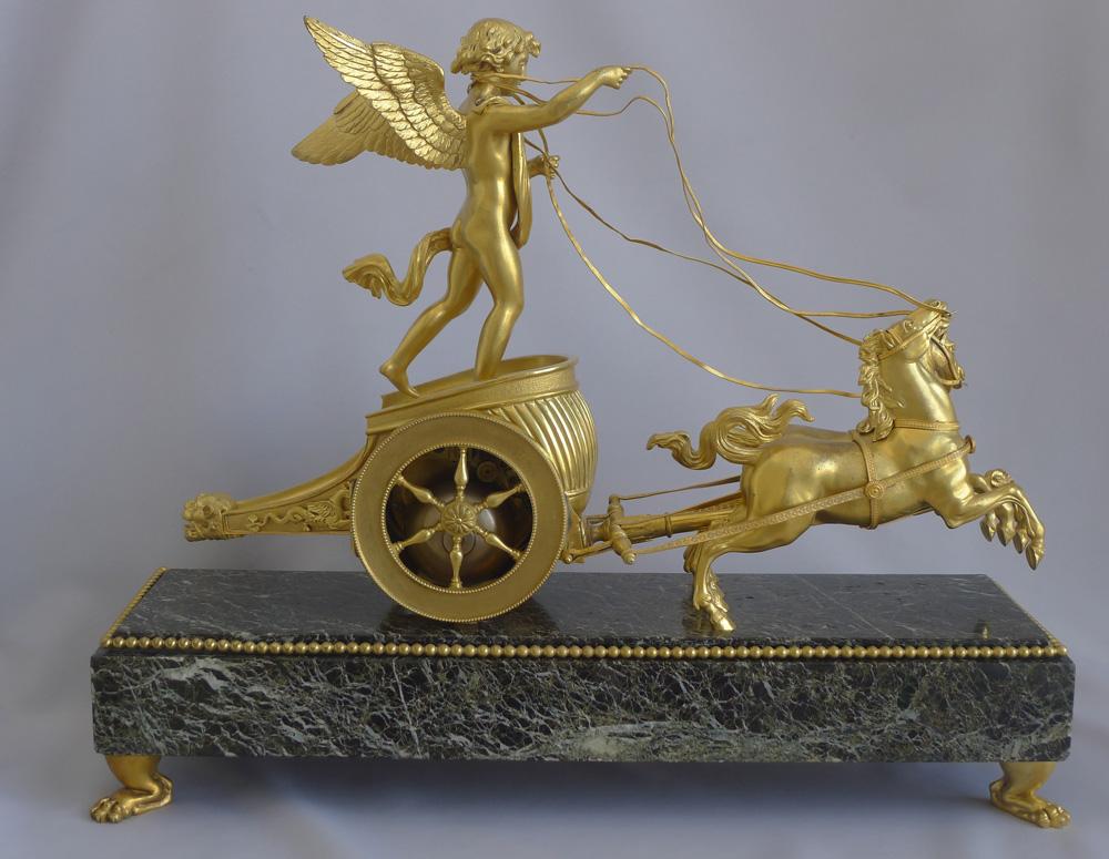 Gilt French Napoleon III chariot clock in ormolu & marble vert For Sale