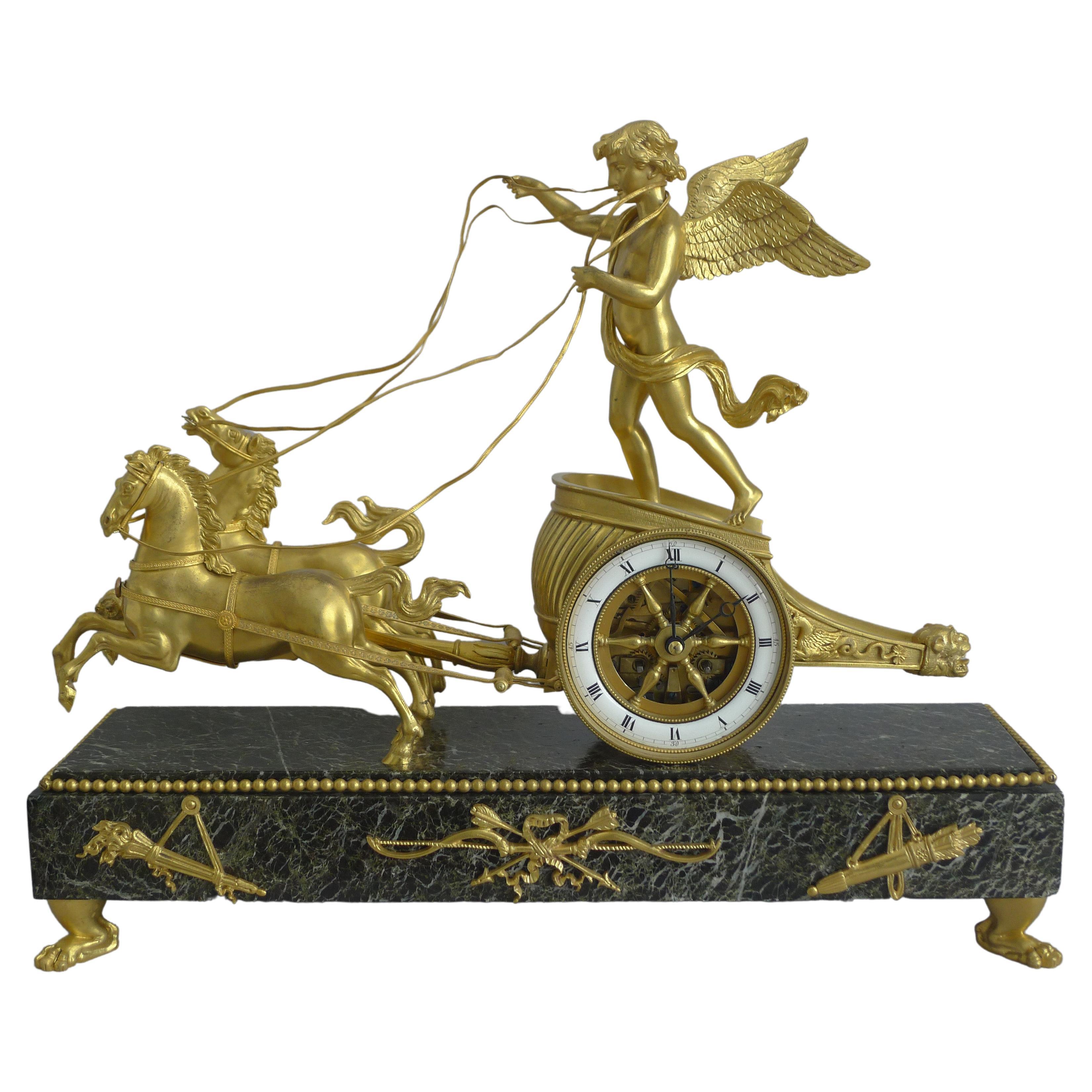 French Napoleon III chariot clock in ormolu & marble vert For Sale