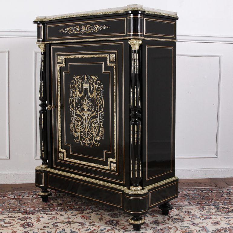 French Napoleon III ebonized single-door cabinet with brass and mother of pearl inlay, a nicely-finished mahogany interior and with its original shaped Carrara marble top.