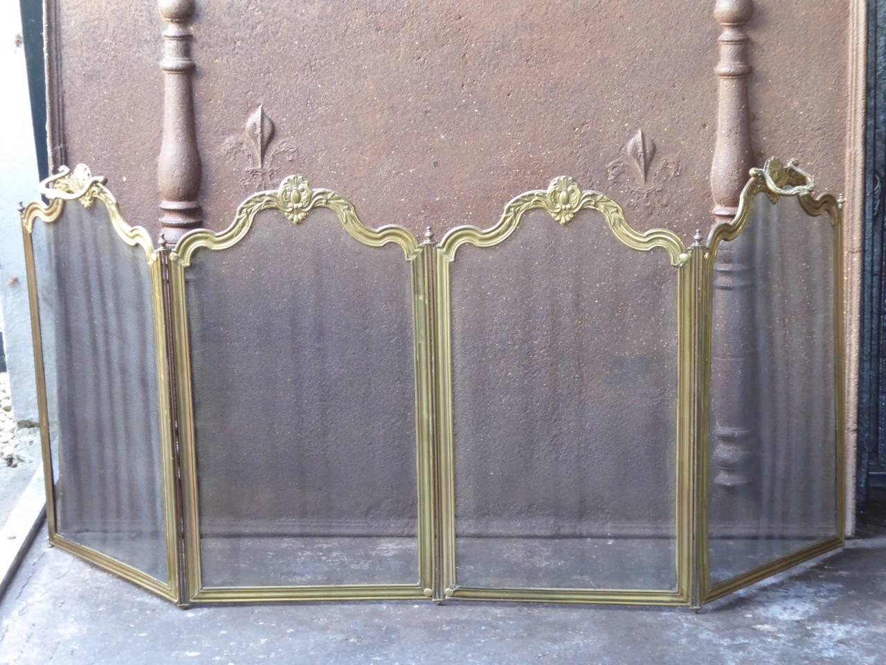 French Napoleon III fireplace screen made of iron and iron mesh.

We have a unique and specialized collection of antique and used fireplace accessories consisting of more than 1000 listings at 1stdibs. Amongst others we always have 300+ firebacks,