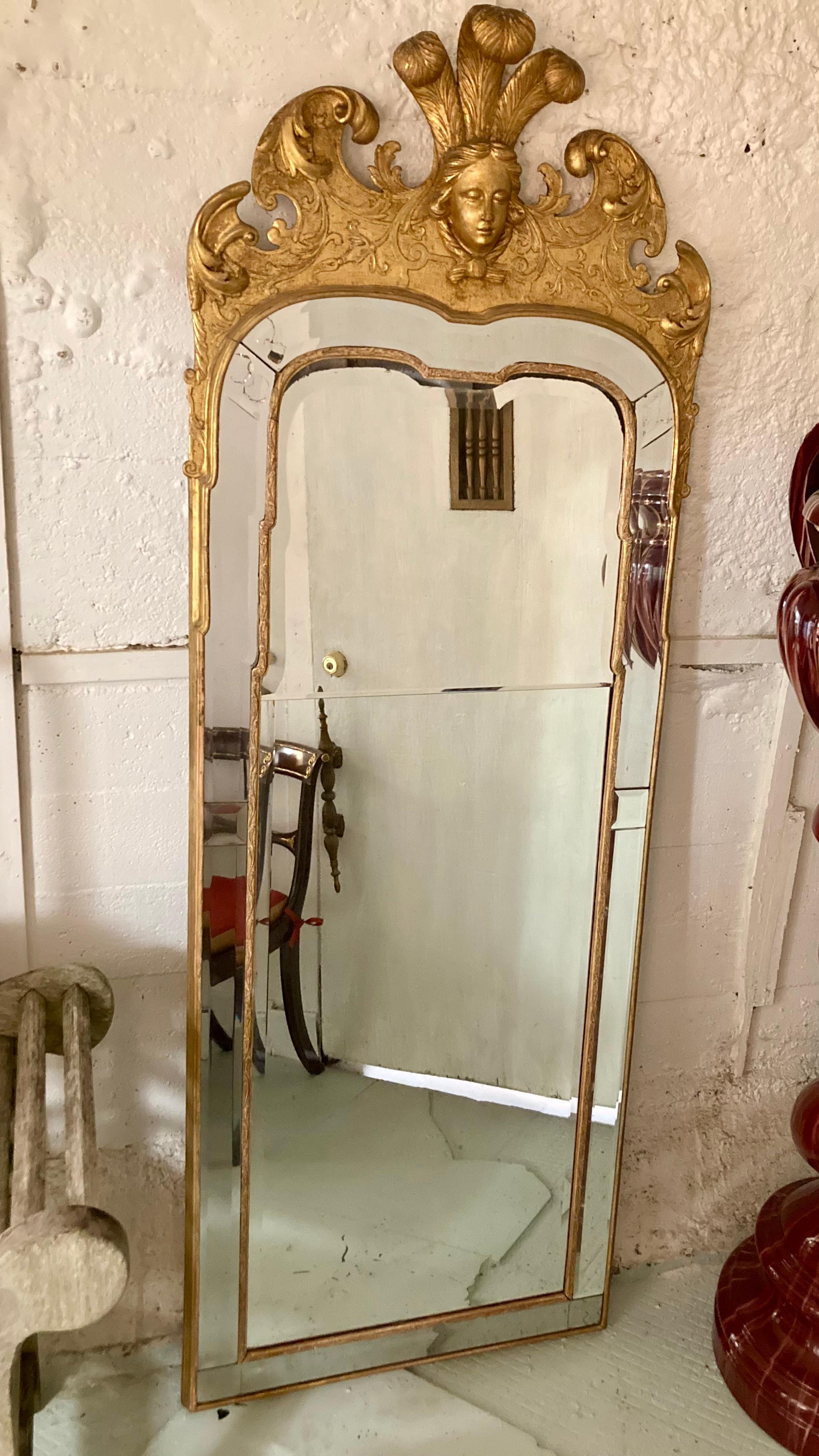 Beautiful French Napoleon III gilt floor mirror. Nice condition for the age, however the glass is loose and delicate.