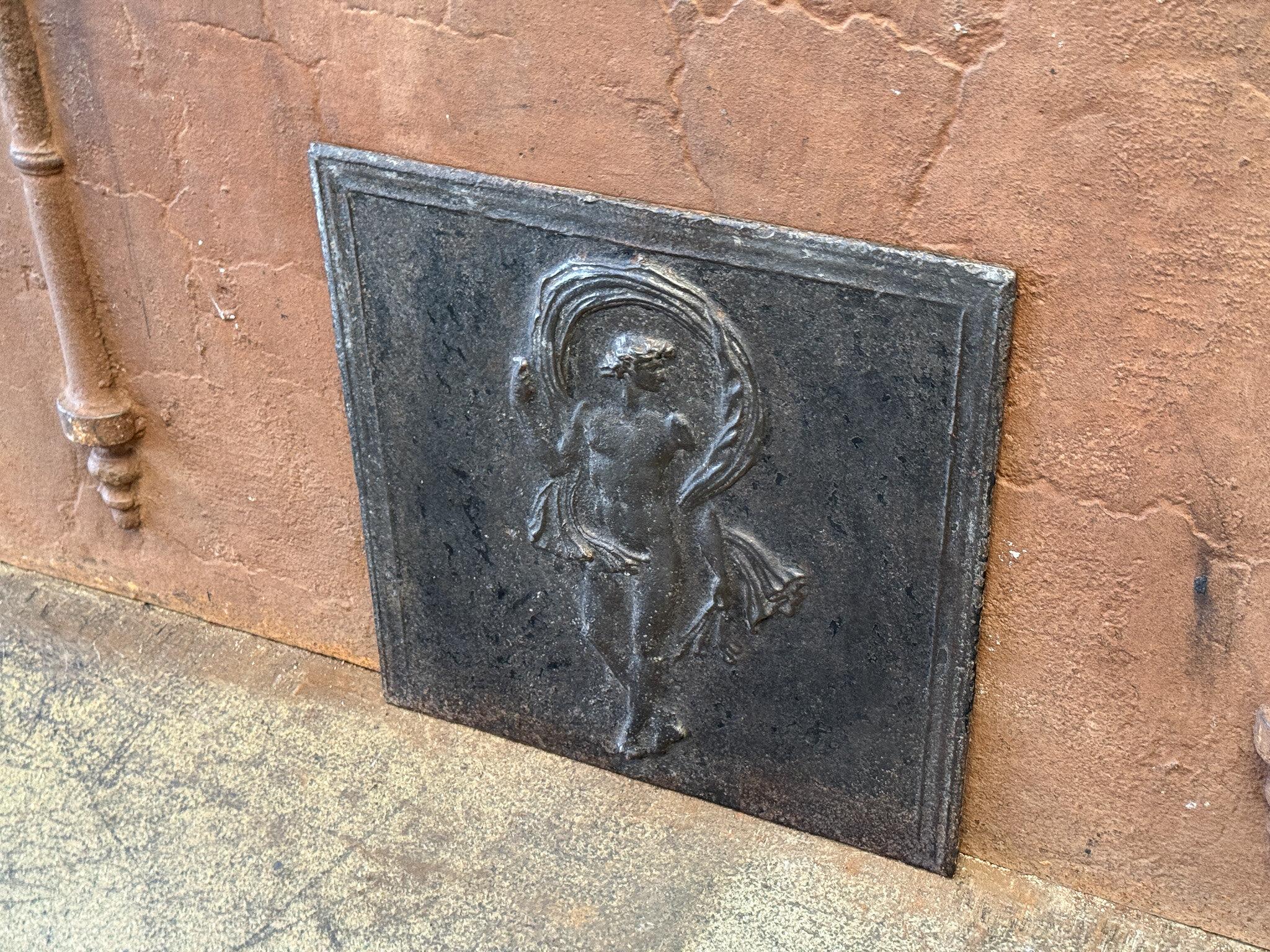 19th century French fireback. The style of the fireback is Napoleon III Period.

The fireback is made of cast iron and has a natural brown patina. Upon request it can be made black/pewter at no extra costs. The condition of the fireback is good, no