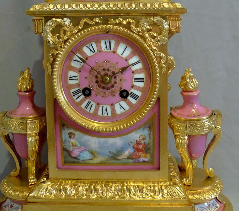 A most attractive French porcelain and ormolu mantel clock with a profusion of porcelain panels. The original gilding is in excellent condition and there are lovely silver highlights to the ormolu. There is no damage of any kind to the porcelain.