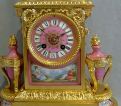 French Napoleon III mantel clock in ormolu and pink porcelain