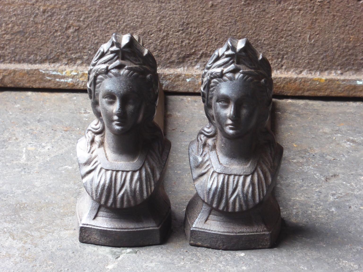 19th-20th century French Napoleon III andirons made of cast iron. Marianne is one of the most prominent symbols of the French Republic, and is officially used on most government documents. Her profile stands out on the official government logo of