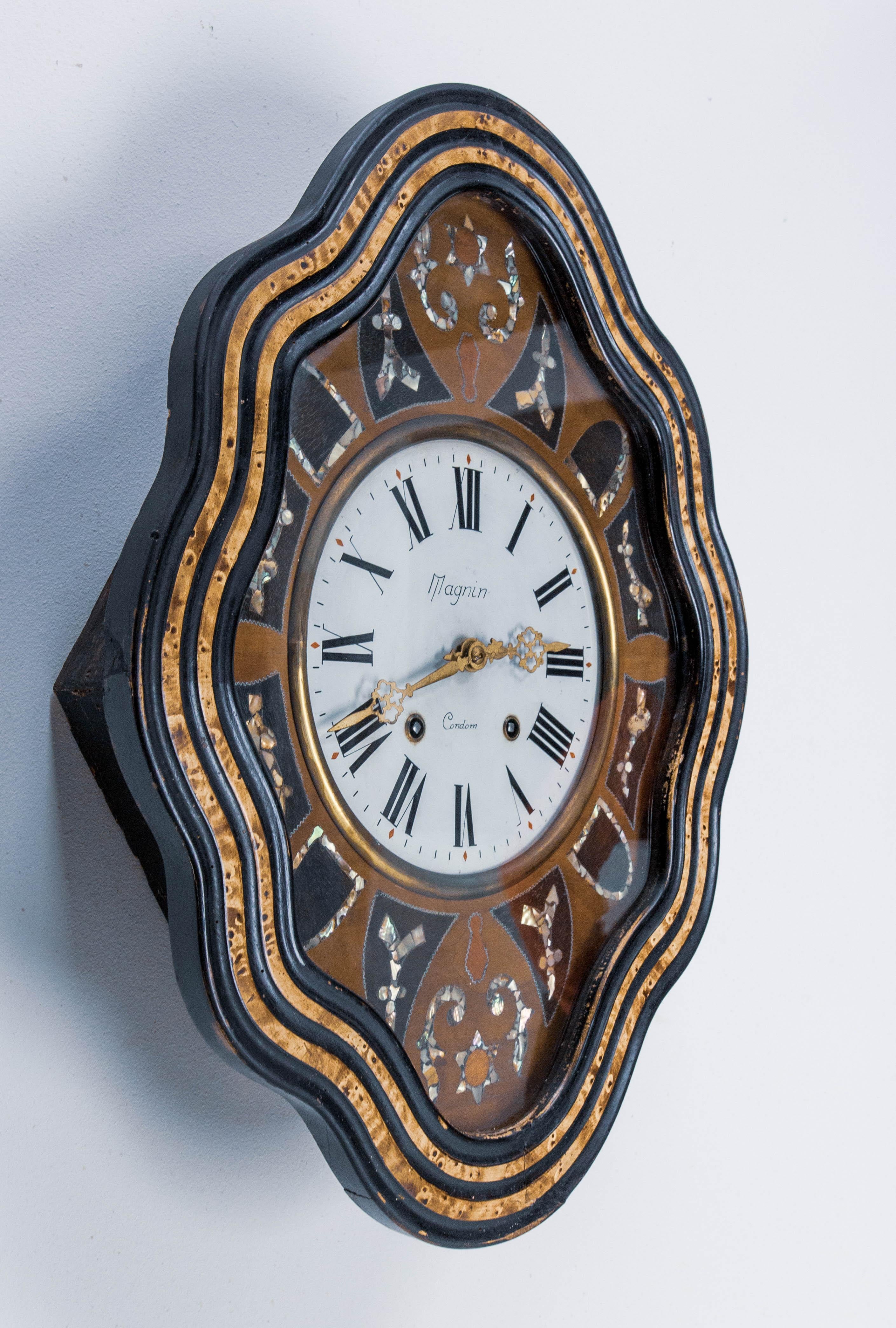 french wall clock with pendulum