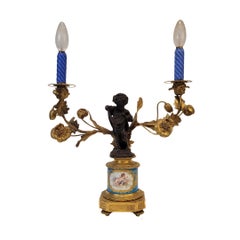 French Napoleon III ormolu and porcelain candlestick
