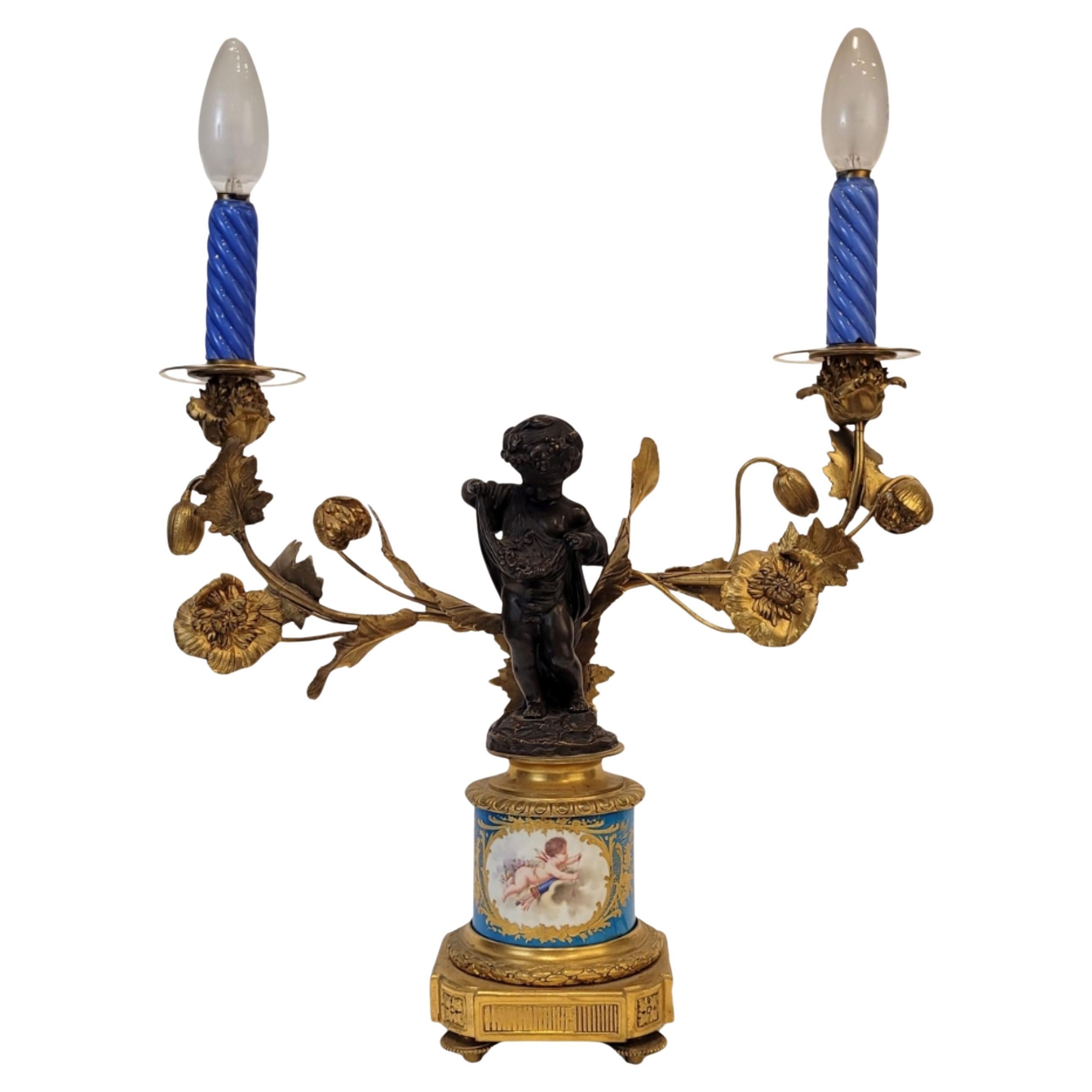 Candelero francés Napoleón III de ormolina y porcelana