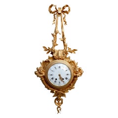 Pendule à cartel en ormolu Napoléon III, d'après Caffieri, vers 1880