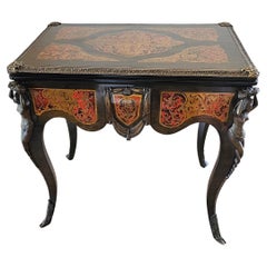 Table à jeux d'époque Napoléon III en marqueterie Boulle à plateau rabattable