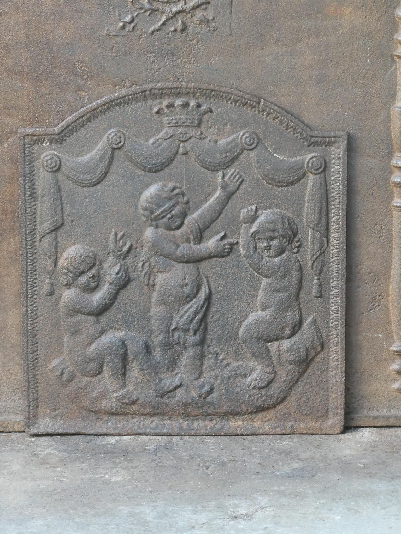 19th century French Napoleon III period fireback with three cupids. The fireback is made of cast iron and has a natural brown patina. Upon request it can be made black / pewter. It is in a good condition, without cracks.





  

    