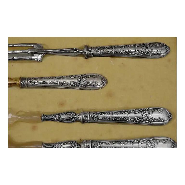 French Napoleon III roast and salad set including: knife and fork for salad, knife, fork and sauce spoon for roast, France, 1880s. Filled silver, Horn and gilt metal. Each handle with minerva 2 (silver 800) and goldsmith stamps. Measures: Length of