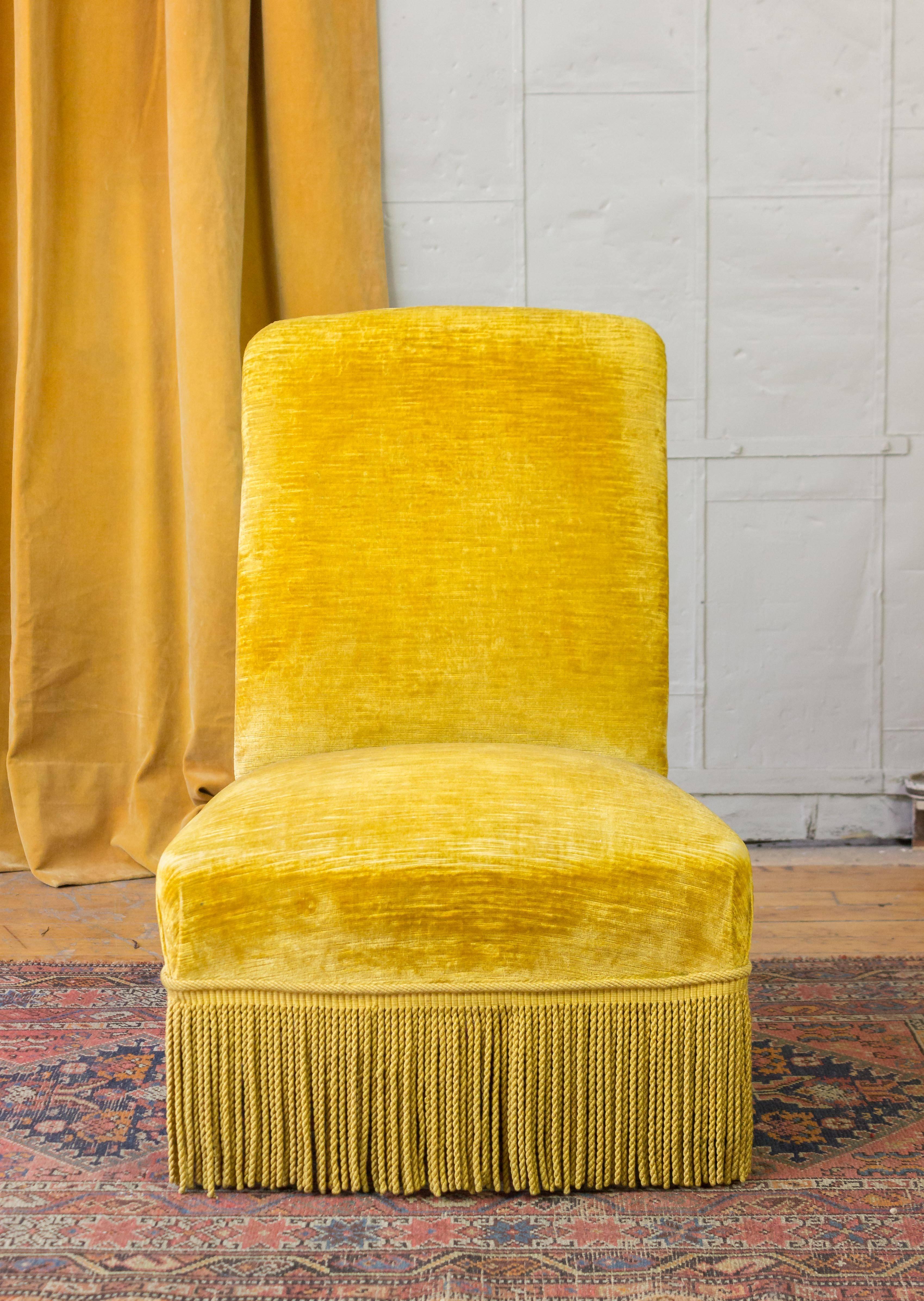 Napoleon III slipper hair upholstered in gold velvet with matching bouillon fringe, French, 19th century.