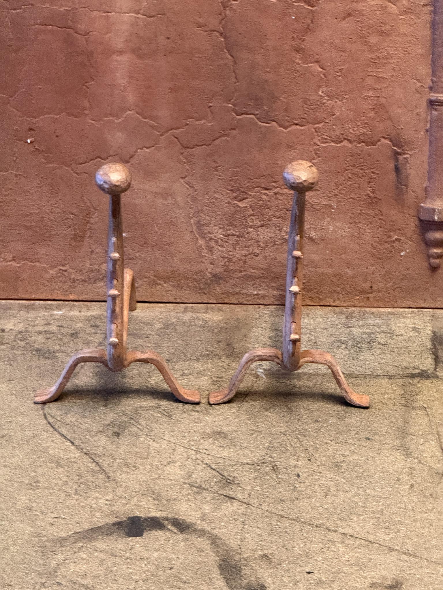 20th century French Victorian Style Andirons or Firedogs, made of wrought iron. The condition is good.