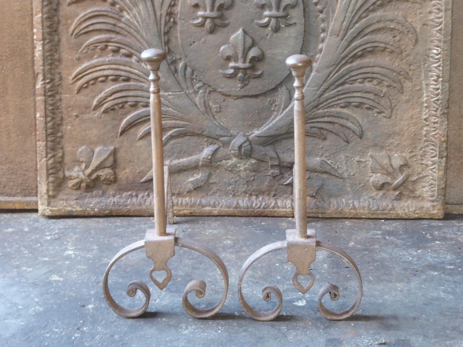 19th-20th century French Napoleon III style andirons made of wrought iron. The andirons are in a good condition.