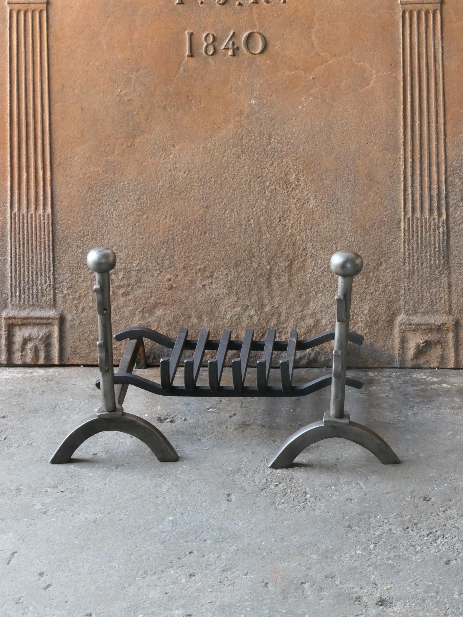 20th century French Napoleon III style fireplace basket, fire basket made of wrought iron and cast iron. The basket is in a good condition and is fully functional.

Width at front is 60 cm (23.6 inches).