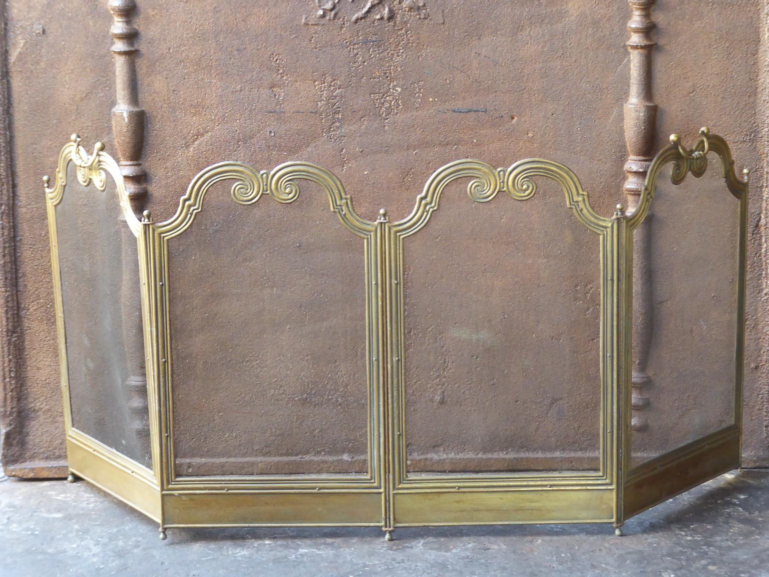 20th century French Napoleon III style four panel fireplace screen. The screen is made of brass and iron mesh. 







 