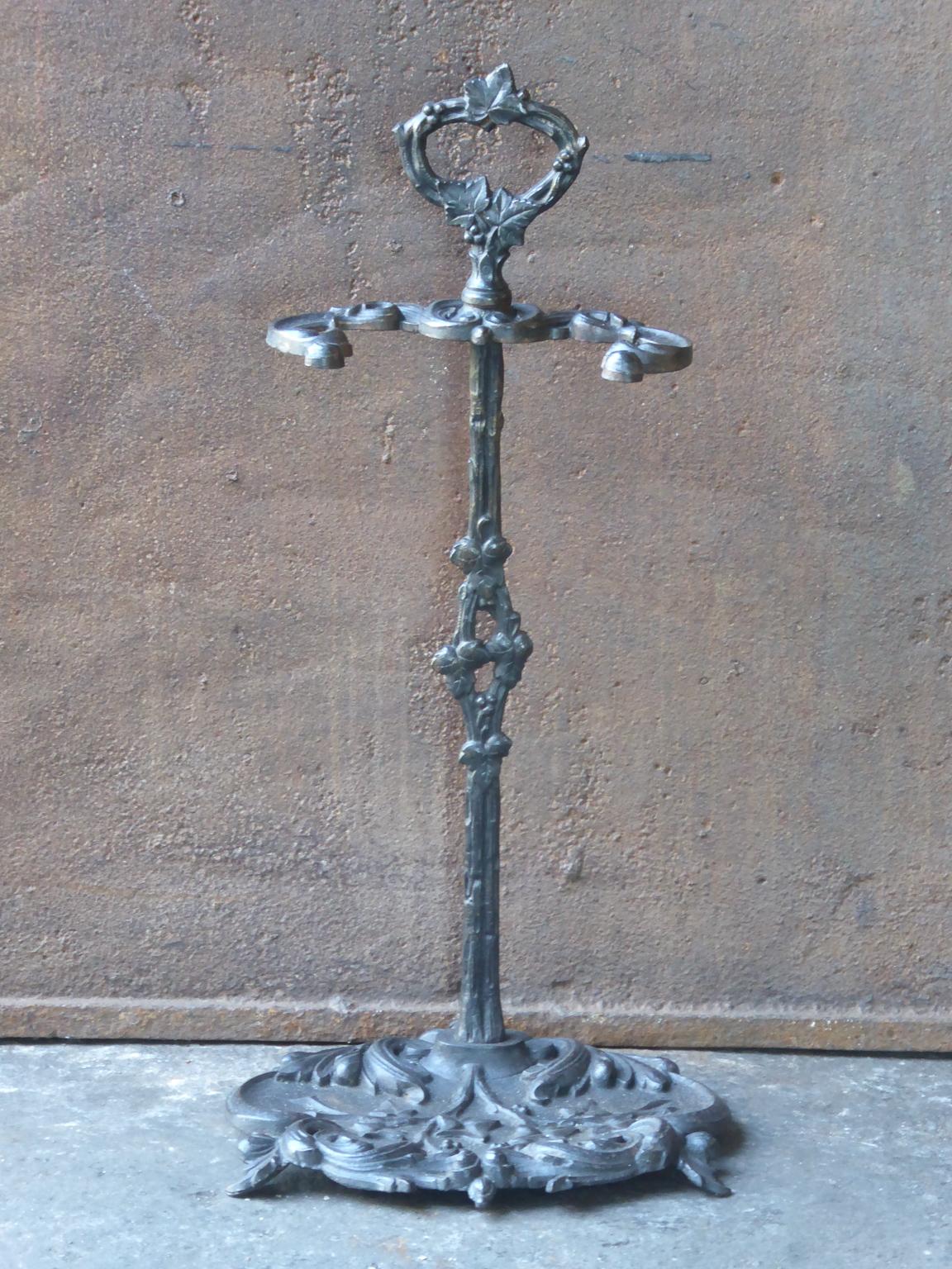 20th century French Napoleon III style fireplace tool stand. The stand is made of cast iron and has a black patina. The stand is in a good condition and is fully functional.








