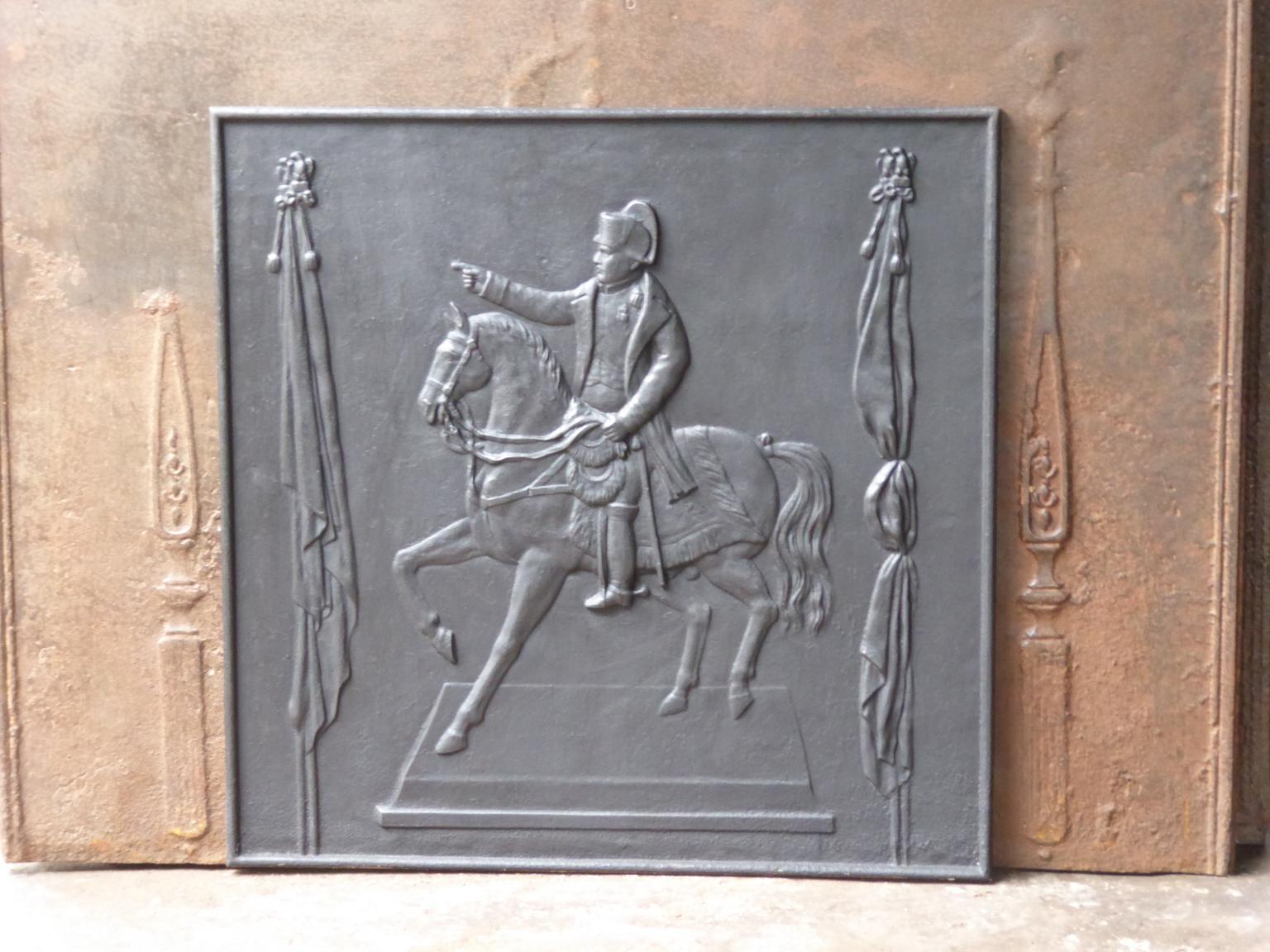 20th century French Napoleon III style fireback with Napoleon on his horse.

The fireback is made of cast iron and has a black / pewter patina. It is in a good condition and does not have cracks.