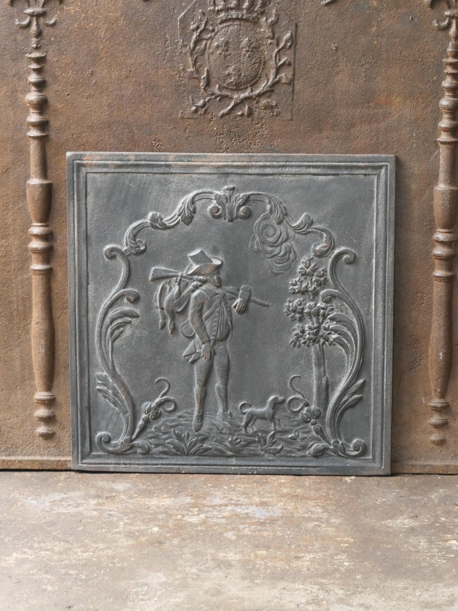 20th century French Napoleon III style fireback with a scene of a hunt returning.

The fireback is made of cast iron and has a black / pewter patina. The fireback is in a good condition and does not have cracks.







