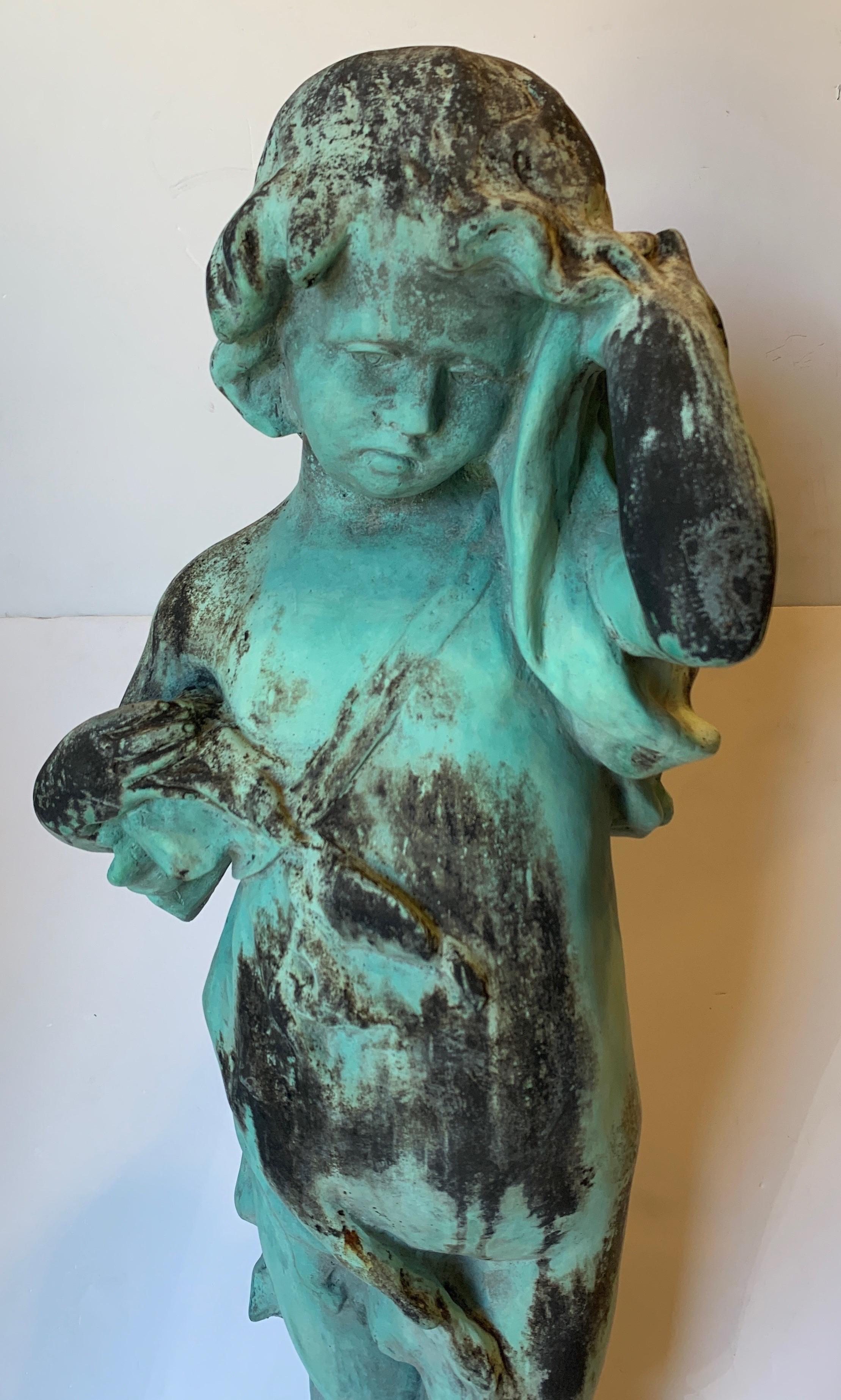 Wonderful natural patina lead figure. Figure of young girl, early 20th century. Outdoor garden statue.