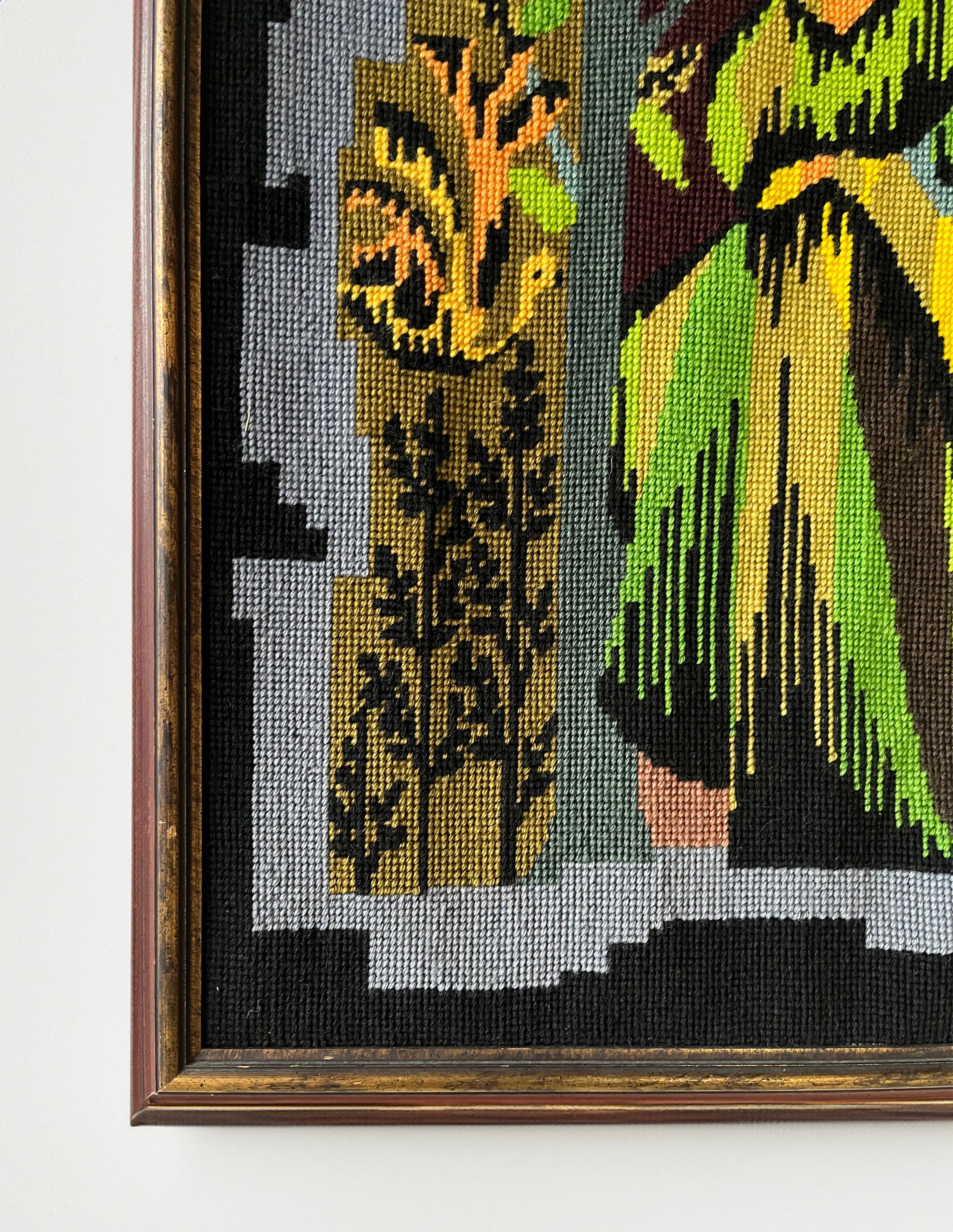 Framed, vibrant and hand-stitched needlepoint featuring the four seasons -- spring, summer, winter and fall -- executed with tapestry wool. The attention to detail is evident with the intricate, elaborate artisan needlework. From a French kit titled