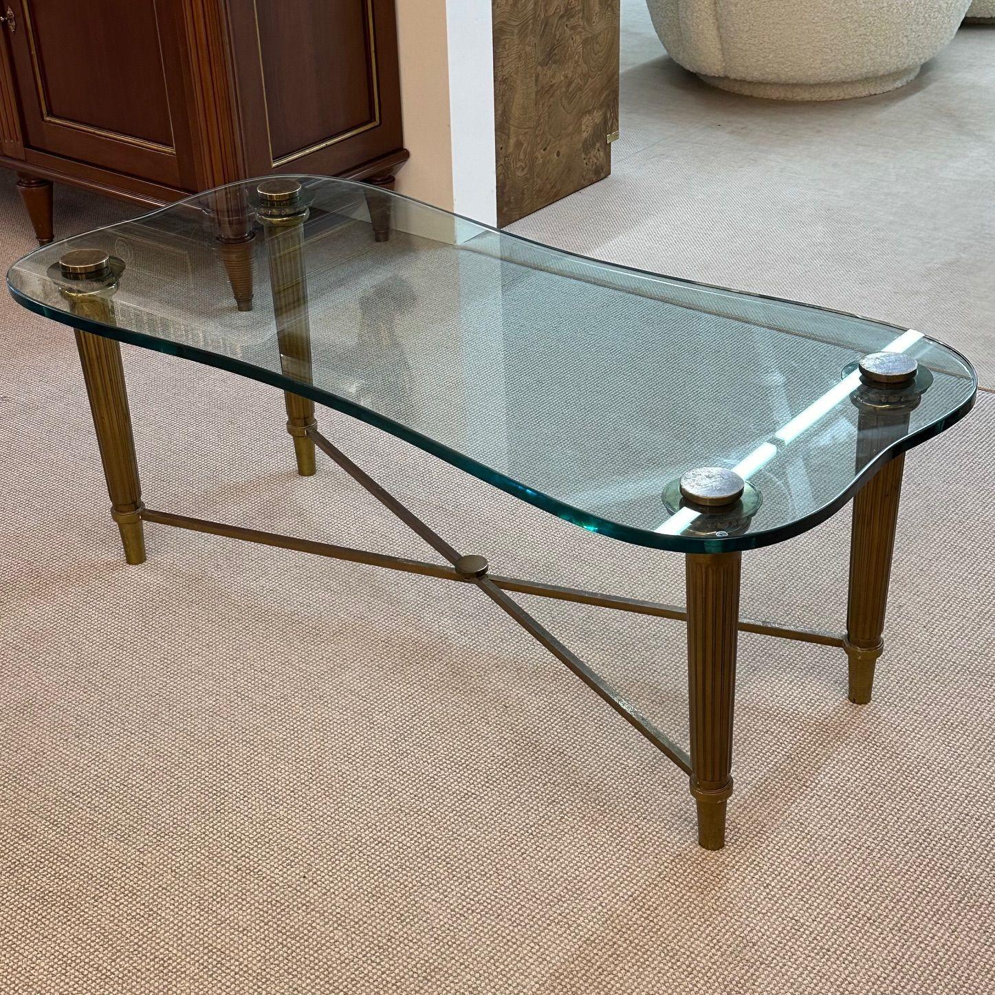 French Neo-Classical Glass Top Coffee Table, Mid-Century Modern PE Guerin Style

Petite coffee table having an organic form glass top supported by four reeded and tapered bronze legs.

Bronze, Glass
American, 1980s

Height: 18 inches, Width: 47