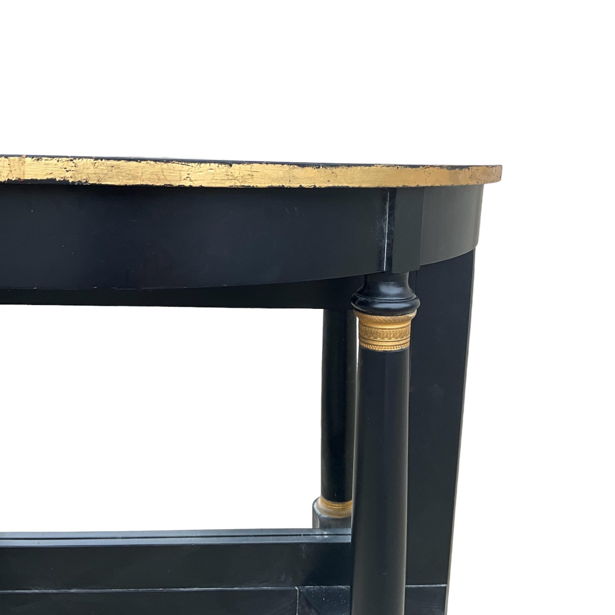 Français Tables consoles noires et bronze doré de la Maison Jansen de style Classic -S/2 en vente