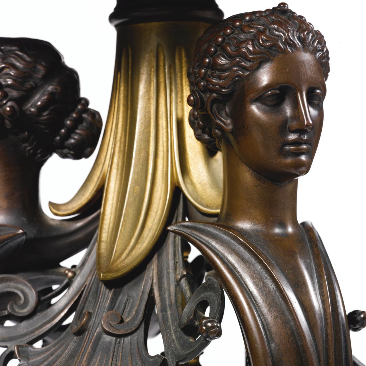 A Fine Quality French Neo-grec patinated and gilt bronze revolving pedestal with female heads wearing greek hairstyles with organically shaped leaf decorations around them. 

Artist: Ferdinand Barbedienne (1810-1892)
Origin: Paris, France
Date: