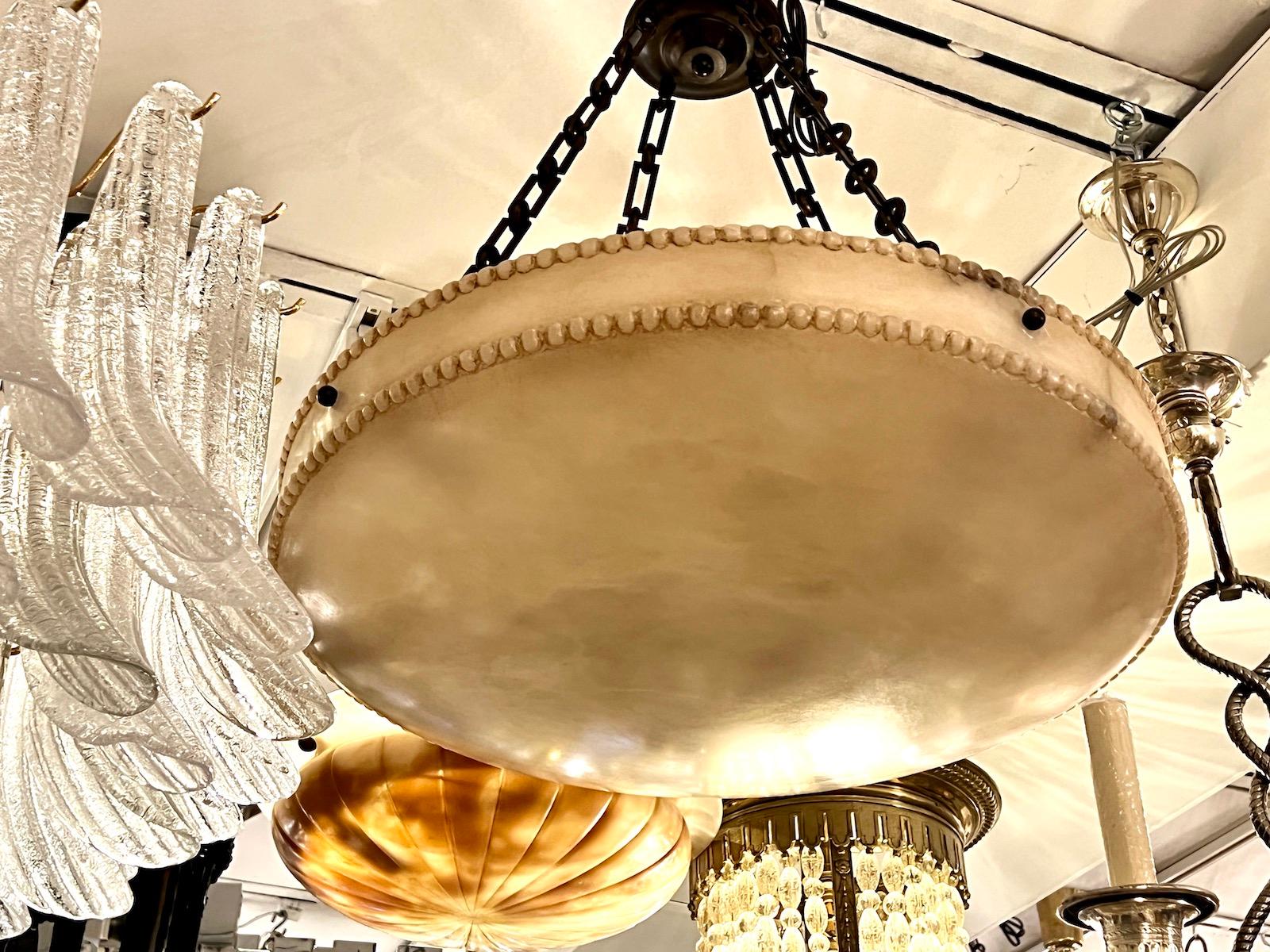 A set of French Neoclassic Alabaster Light Fixture, Sold Individually In Good Condition For Sale In New York, NY