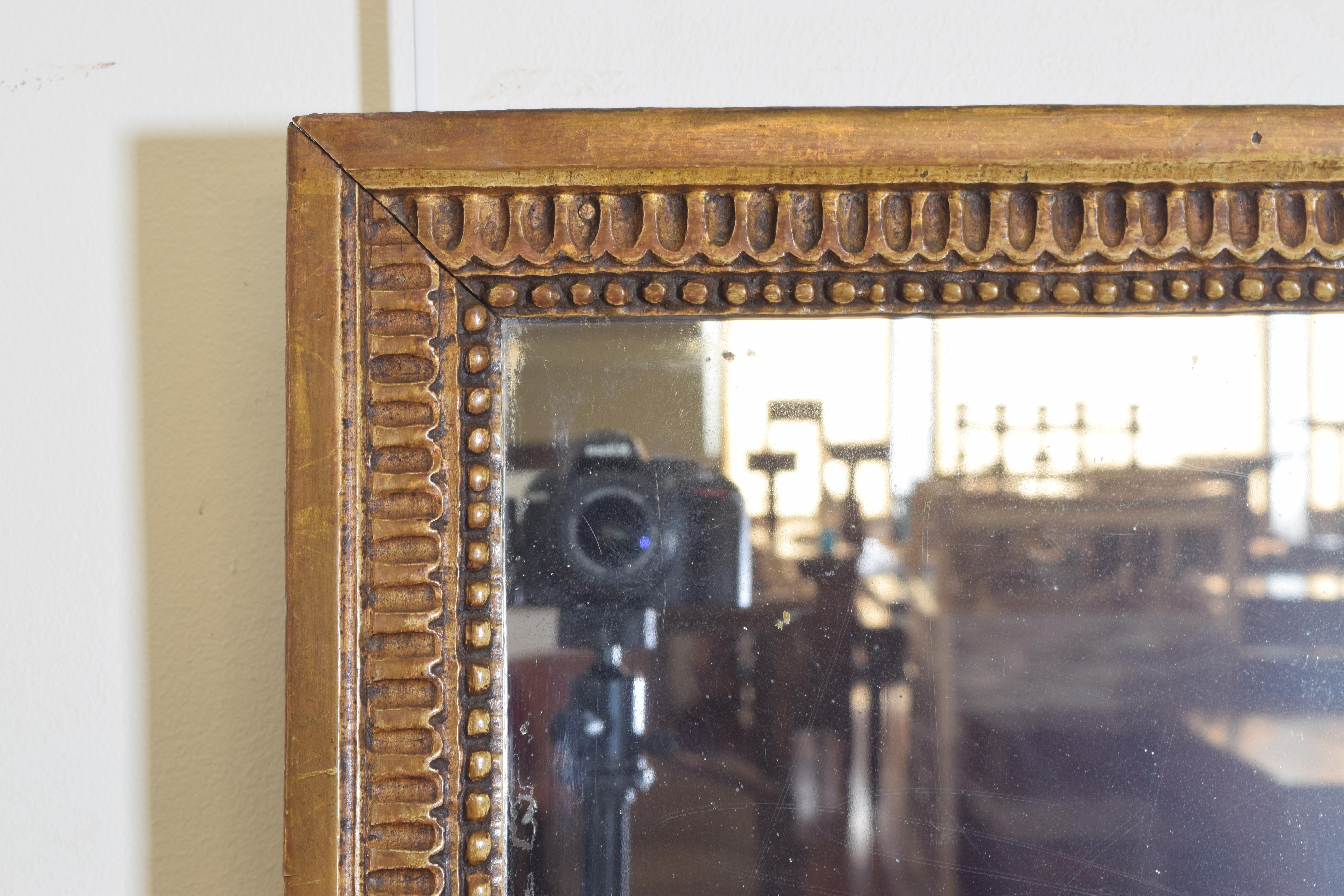 Early 19th Century French Neoclassic Carved Giltwood Wall Mirror, First Quarter 19th Century