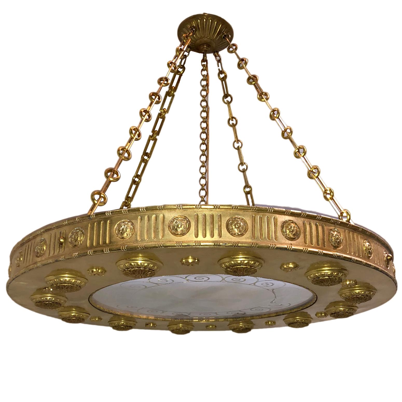 A large circa 1920s French gilt bronze and etched glass light fixture with interior lights.

Measurements:
Diameter 31
