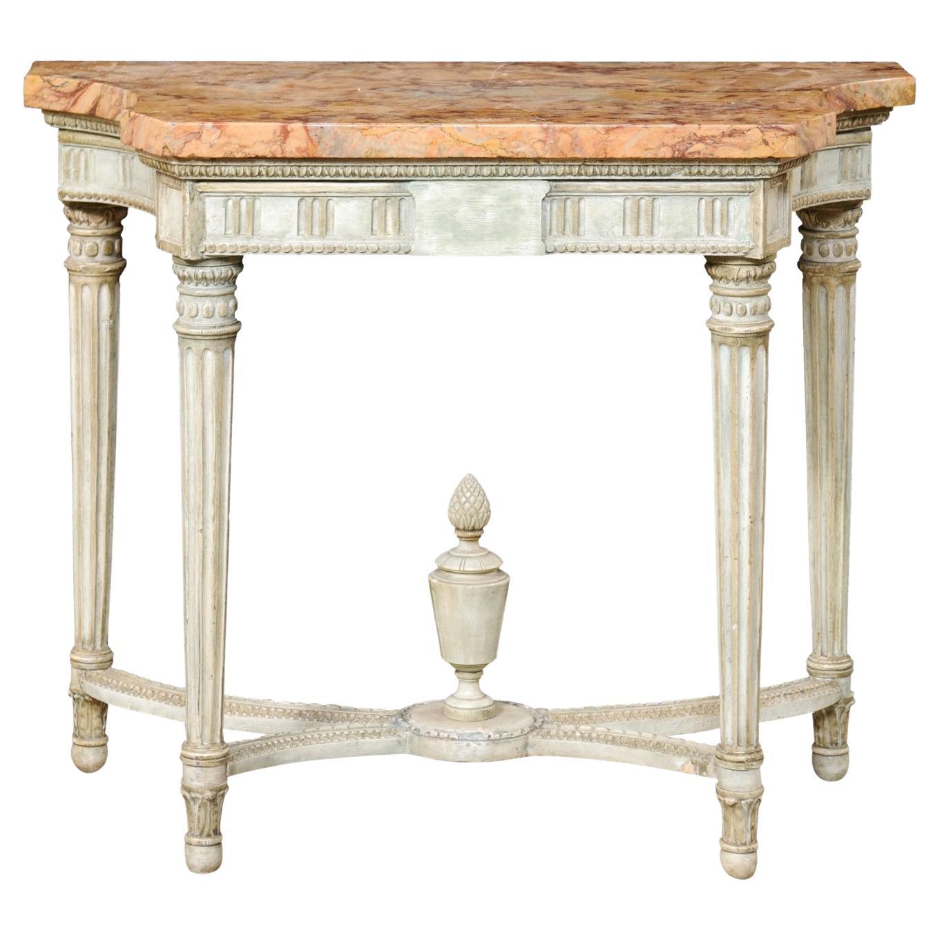 Console en marbre d'époque néoclassique française avec fleuron en forme d'urne sculptée sur le dessous