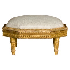 Antique French Neoclassical 19th Century Carved Giltwood Footstool with Linen Upholstery