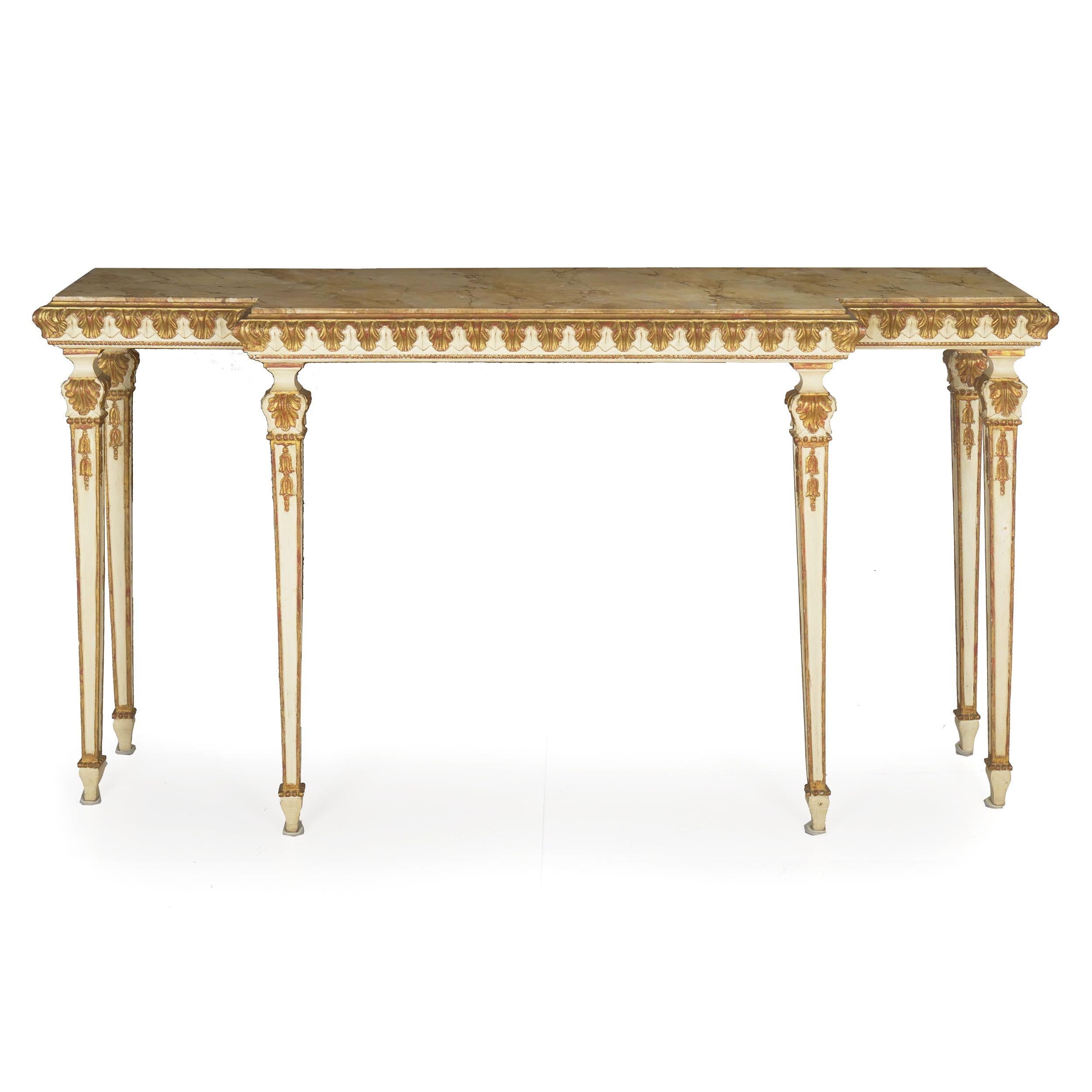 Neoclassical style parcel gilt console table with faux-marble painted top
Continental, circa mid-20th century
Item # 007LQG30U 

An attractive 20th century console carved in the manner of the neoclassical forms of a century prior, this lovely