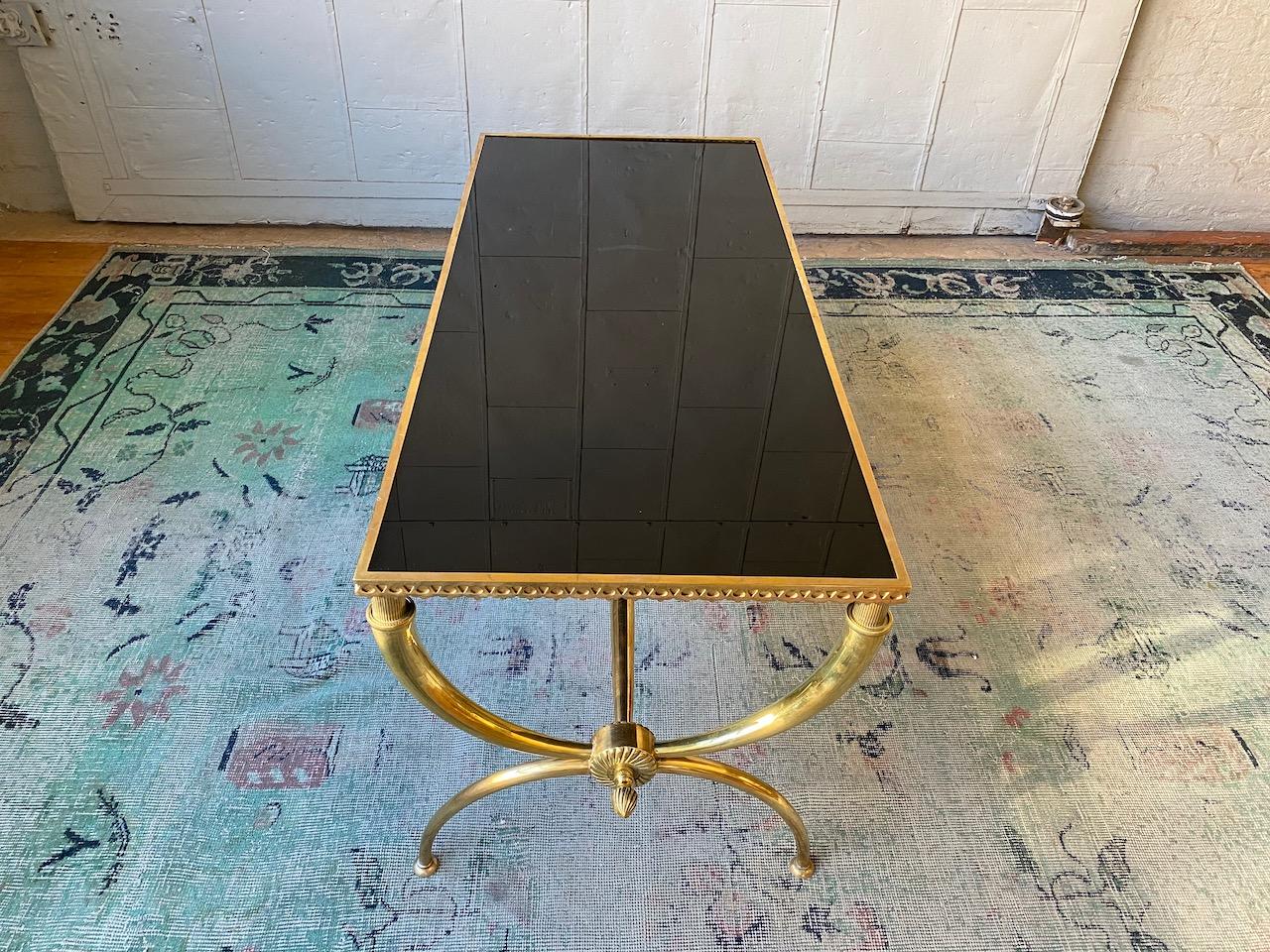 French Neoclassical Brass Coffee Table with Black Glass by Raymond Subes 3