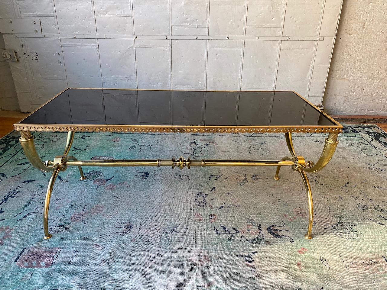 French Neoclassical Brass Coffee Table with Black Glass by Raymond Subes In Good Condition In Buchanan, NY