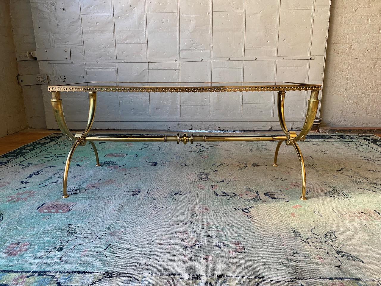 Mid-20th Century French Neoclassical Brass Coffee Table with Black Glass by Raymond Subes