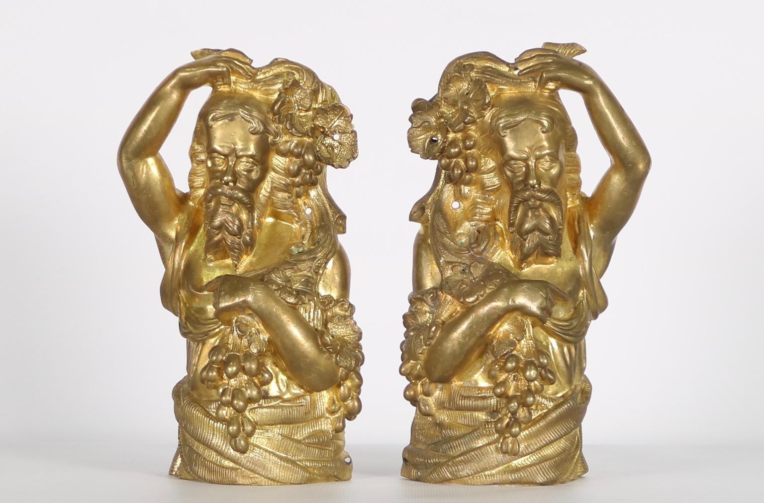 Neoclassical bronze ormolu French finials in the form of bearded men with grape motif. This pair dates from the 19th century and is in excellent vintage condition. Each has wear consistent with age and use. 

Dimensions listed are per item.