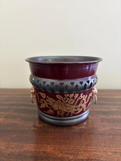 French Neoclassical Burgundy & Gold Tole Cachepot with Brass Lion Heads