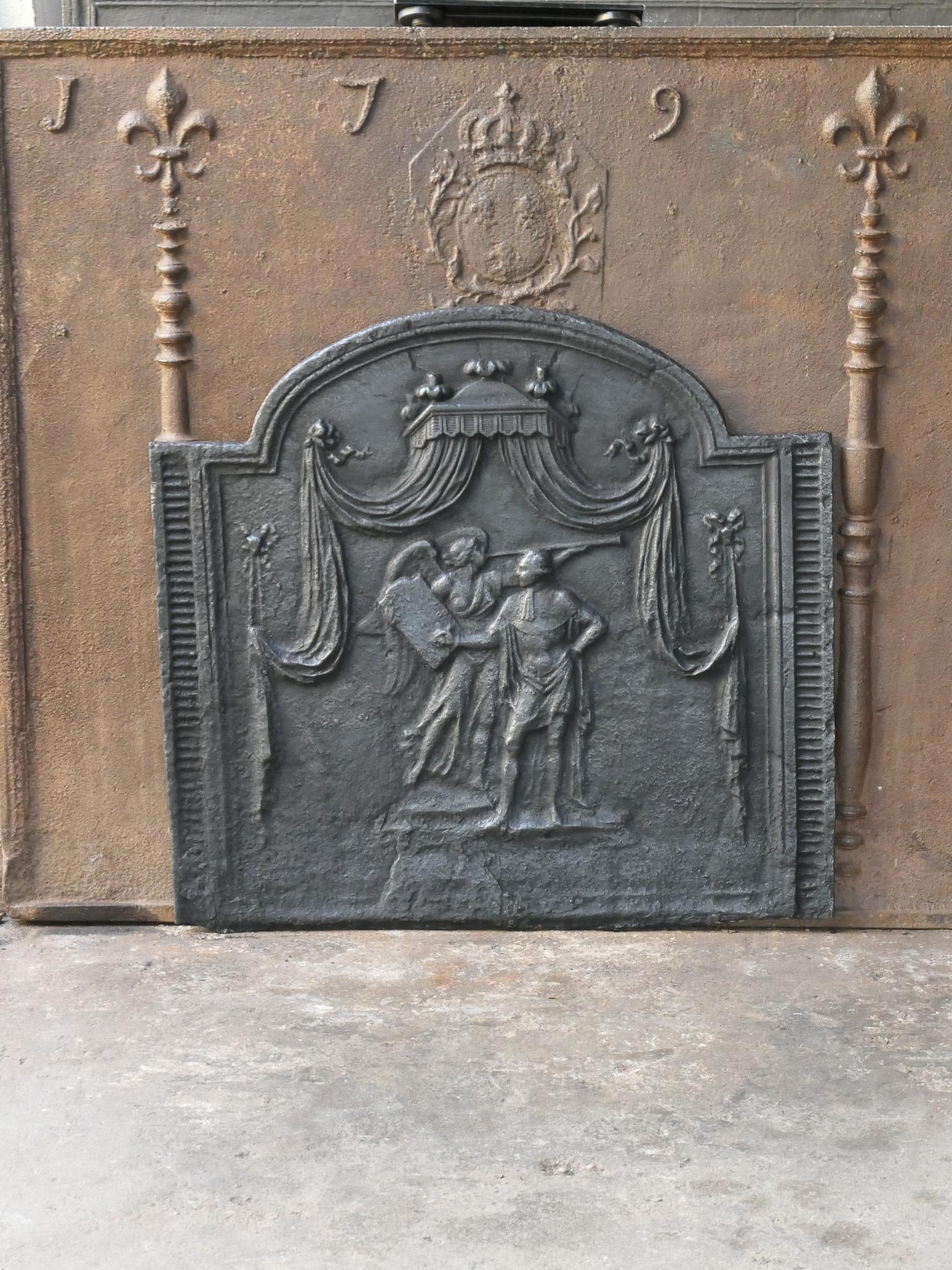 Late 18th or early 19th century French neoclassical period fireback.

The fireback is made of cast iron and has a black / pewter patina. It is in a good condition and does not have cracks.







 
